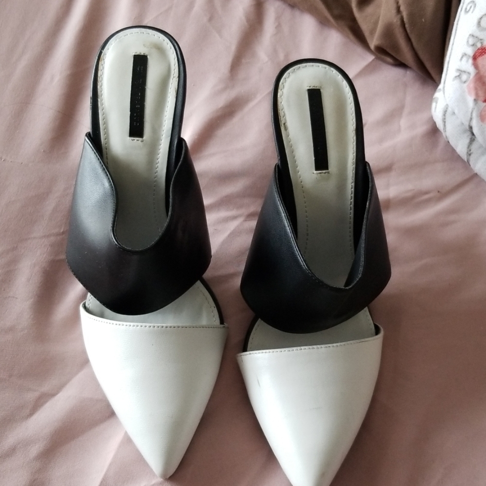 Black and white and white color block mules